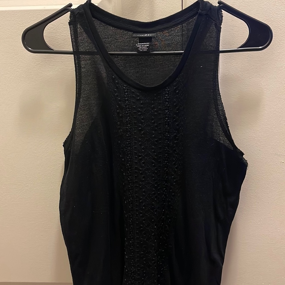 Black short sleeve shirt size S.